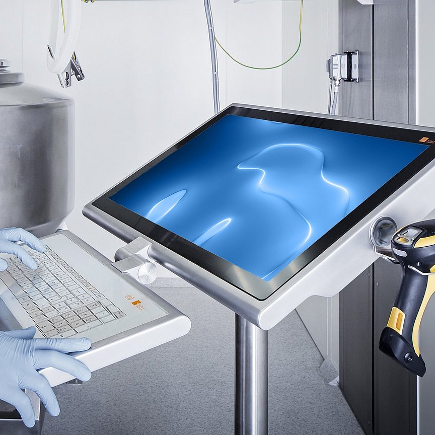 Laboratory technician at GMP-compliant mobile keyboard